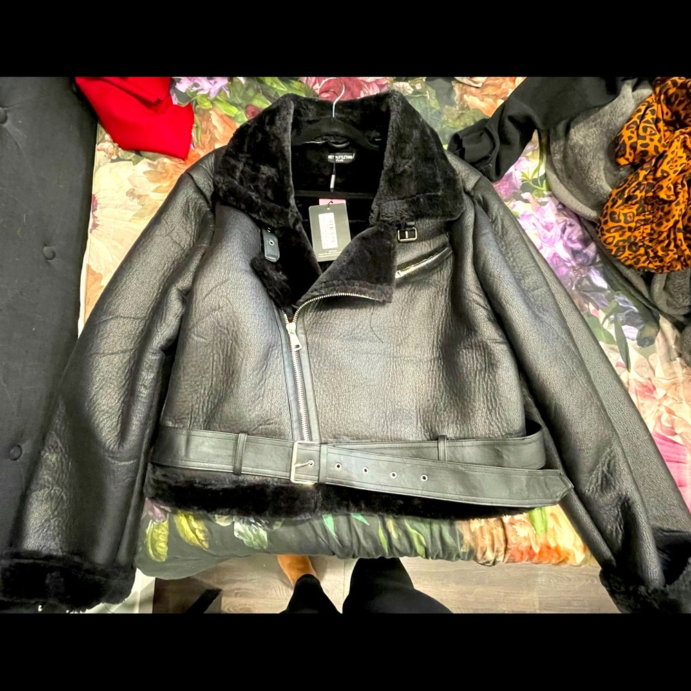 Black leather and fur jacket from PLT